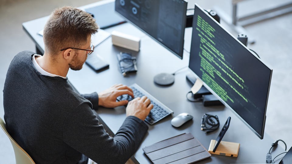 man working at a computer